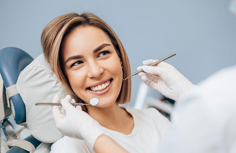 Patient smiling during orthodontic treatment at Michael Woods Orthodontics clinic.
