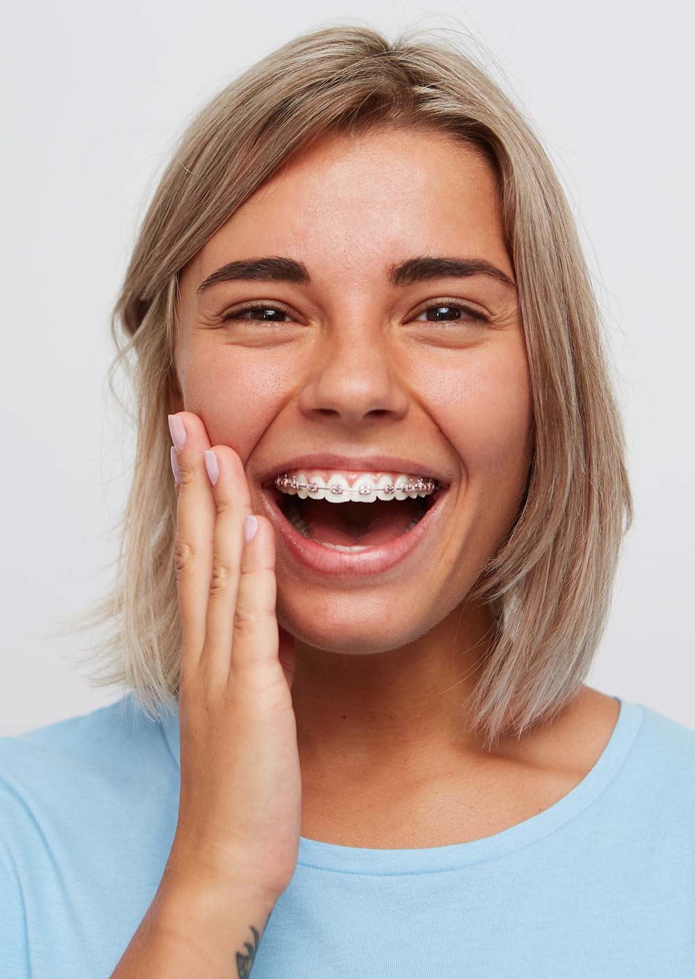 Woman smiling with braces